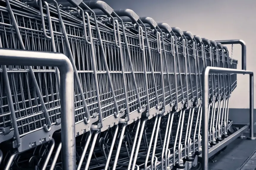 Row of empty metal shopping carts