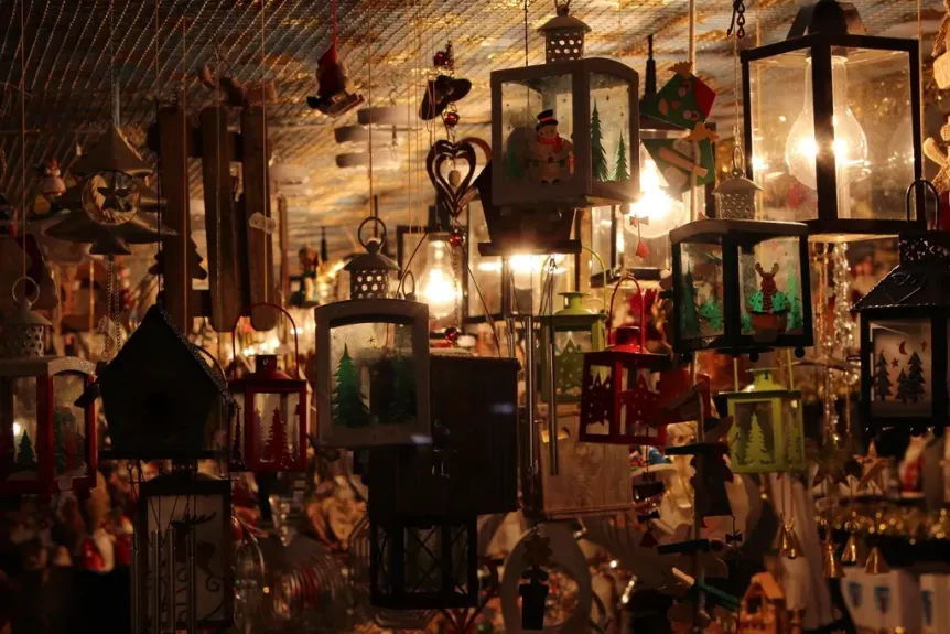 Holiday lanterns and ornaments hanging in a festive shop